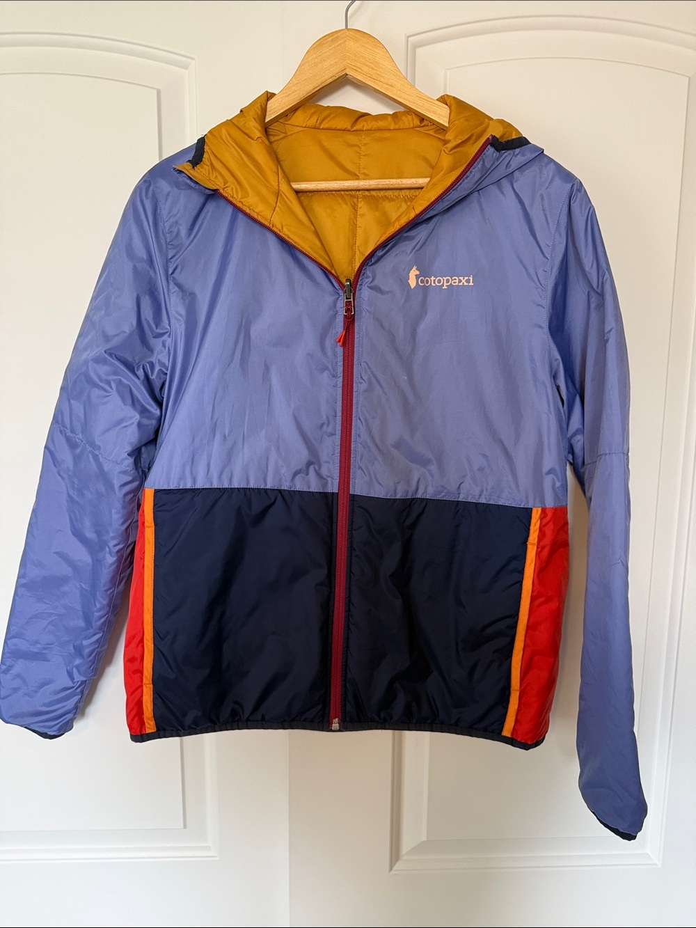 Cotopaxi Lavender, Mustard, Red, and Navy Colorblock Puffer Jacket